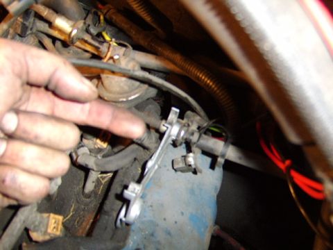 1989 Ford Bronco - my finger is pointing in the direction the tool has to go in order to unlock the connection and there is another, larger connection to the…