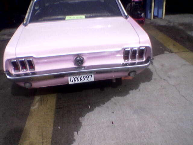 Pink 1967 Ford Mustang rear view with California license plate 4XKK997