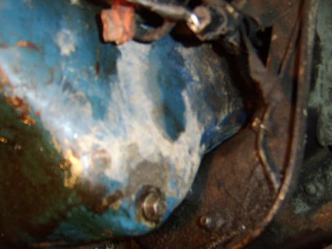 1989 Ford Bronco - here the oil pan is unbolted and sitting on the crossmember