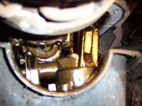 1989 Ford Bronco - this is a shot of the oil pump and pick up tube which has to be removed before the pan can come out.