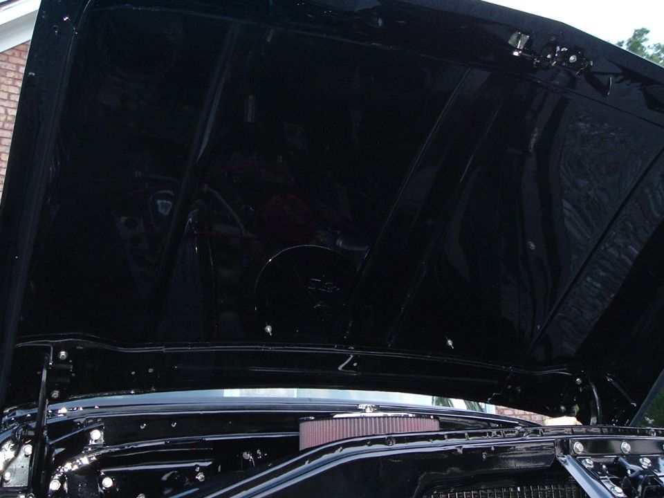 1966 Ford F-100 engine bay, hood open, showing air cleaner and inner hood panel