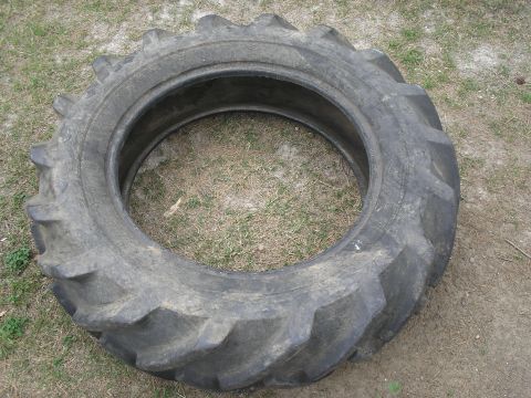 1990 Ford Bronco - tractor tire 11.2x24 yard art or spare? your call best offer is accepted.