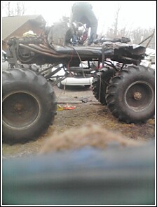 2004 Jeep Wrangler - This monster truck appears to be a project in progress, with its engine and chassis exposed. The Supermotors.net logo is visible at the bot…