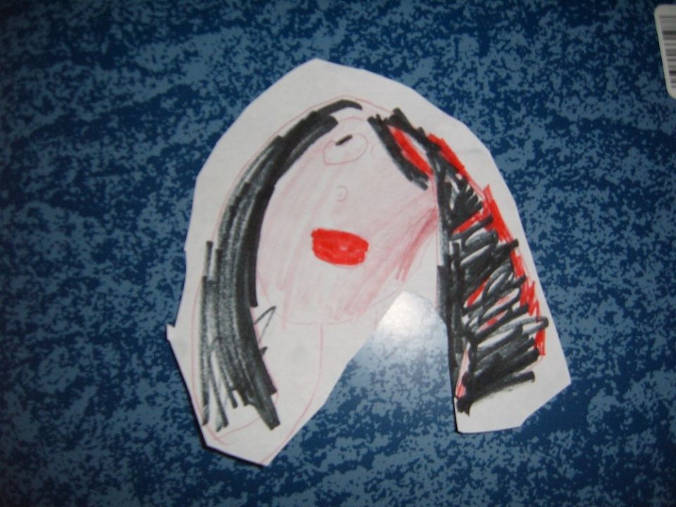 Child's drawing of a person with black hair and red lips on a blue textured background