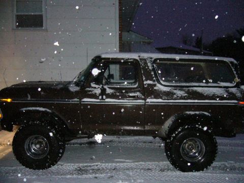 1979 Ford Bronco - Ford Bronco covered in snow during a winter storm.
