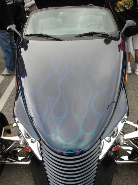 1998 Ford Crown Victoria - Overhead view of a Plymouth Prowler hood with silver ghost-flame graphics and exposed chrome front bumper struts.