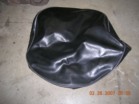 1996 Ford Bronco - Black tire cover with gray piping, photographed on February 26, 2007.