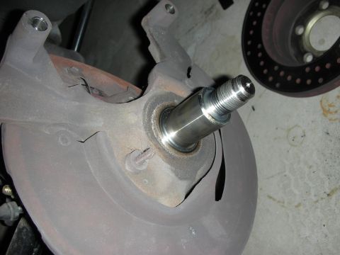 1992 Ford Crown Victoria - Close-up of a chrome-plated car part, likely a shifter or handle component.