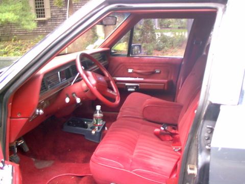 1987 Ford Crown Victoria LTD - View in from the drivers door. Note that my interior is red, the flash makes it look pink.
