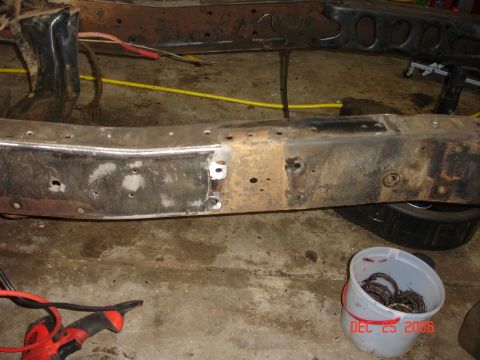 1978 Ford Bronco - Close-up of a vehicle frame undergoing repair, with a bucket of parts nearby. The date stamp indicates October 25, 2008.