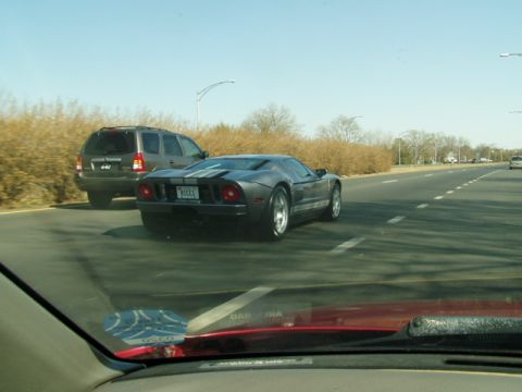 1993 Ford Probe - Ford GT seen on the highway, with an SUV in the adjacent lane.
