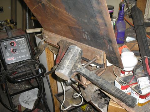 1966 Ford Bronco - in vise with "adjusting" tool