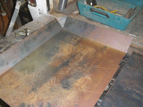 1966 Ford Bronco - Sheet metal pan project in progress, with tools nearby.