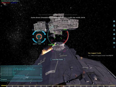 1990 Ford Probe - A screenshot from a space combat game shows two large starships engaged in battle amidst a starry expanse.