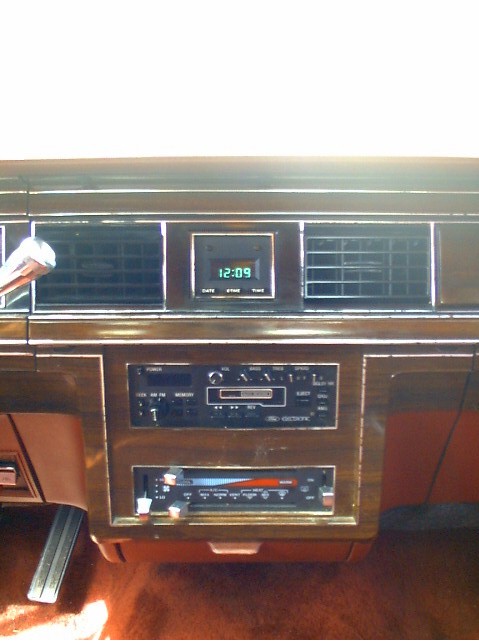 1987 Ford Crown Victoria LTD - Clock, cheapo radio, and climate control.