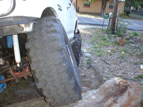 1989 Ford Bronco - This 1989 Ford Bronco features significant suspension and tire upgrades, suggesting off-road use.