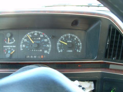 1988 Ford Bronco - The dashboard shows the speedometer, tachometer, and fuel gauge. The odometer reads 68,946 miles.