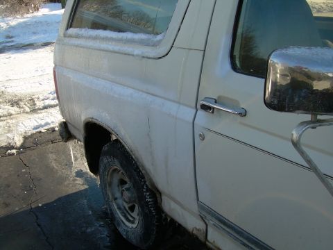 1988 Ford Bronco - White 1988 Ford Bronco covered in ice after a winter storm.