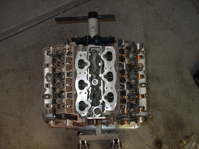 Engine block and cylinder heads on an engine stand