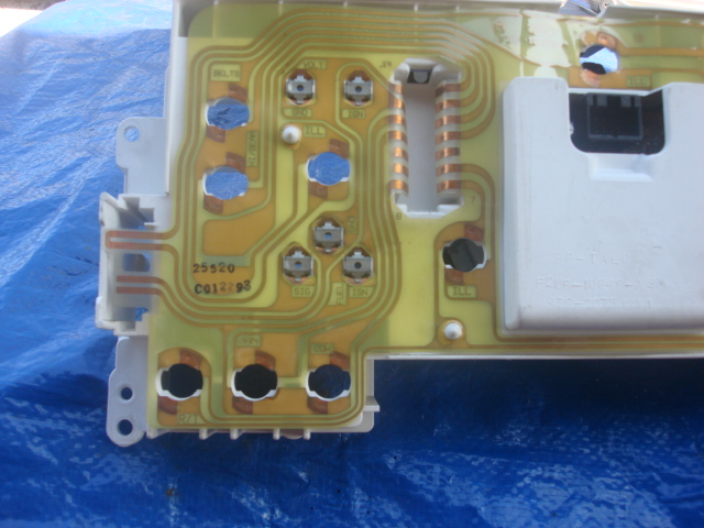 This i the back side of the 1992 bronco dash. the 3 clips in the middle is where the fuel guage makes its connection.