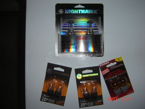 1997 Dodge Grand Caravan - Various automotive light bulbs are displayed, including GE Nighthawk and Sylvania brands.