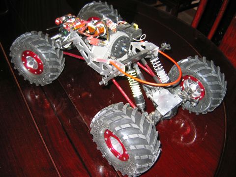 1985 Ford Bronco - This RC monster truck features a complex internal structure and tires, suggesting it is built for off-road performance.