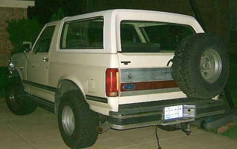 1991 Ford Bronco - This 1991 Ford Bronco is shown from the rear, a spare tire mounted on the tailgate.