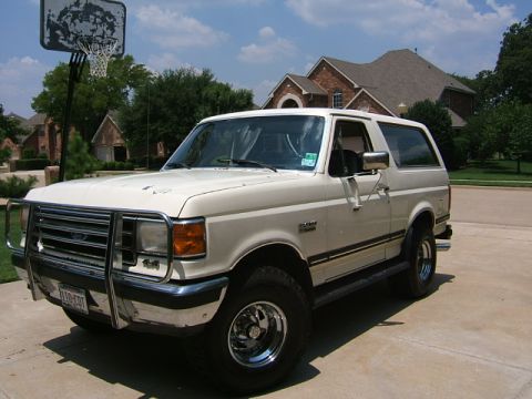 1991 Ford Bronco - This 1991 Ford Bronco is parked in a suburban driveway on a sunny day.