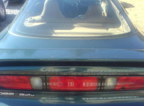 1996 Ford Probe - Rear view of a 1996 Ford Probe, showing its distinctive taillights and spoiler.