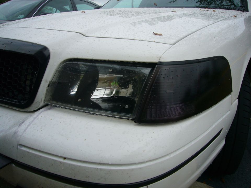 White 2000 Ford Crown Victoria front corner lights with tinted lenses