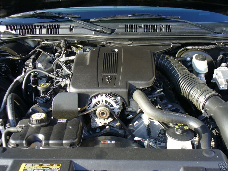 http://www.crownvic.net/drock96marquis/tach.htm

2005 CVPI engine bay
Image Courtesy Liquid
http://www.crownvic.net/liquid