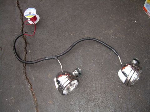 1988 Ford Bronco - Aftermarket trailer lights and wiring kit laid out on a concrete floor.