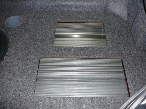 1997 Mercury Grand Marquis - WOW!!!! Finished finally. Here is a shot of the amps mounted under smoked polycarbonate.