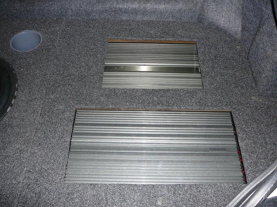 WOW!!!! Finished finally.  Here is a shot of the amps mounted under smoked polycarbonate.