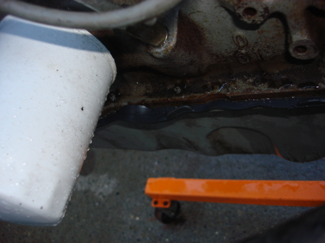 if you look under the oil filter you can see the pan gasket sticking out all over.