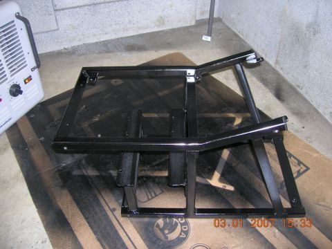 1996 Ford Bronco - Black metal frame assembly, possibly for a vehicle part, photographed on January 3, 2007.