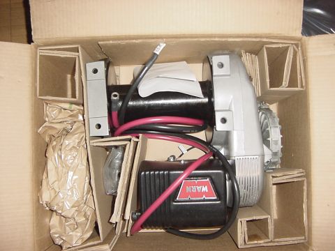 1994 Ford Bronco - New Warn winch in its original packaging, ready for installation.