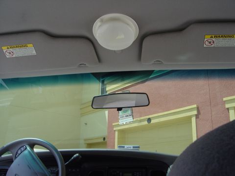 2000 Ford Crown Victoria - Interior view of a 2000 Ford Crown Victoria, looking forward from the passenger seat.