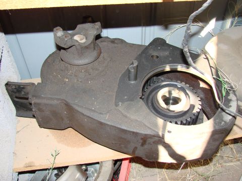 1979 Ford Bronco - This transfer case is shown in a close-up view, revealing its internal gears and external connections.