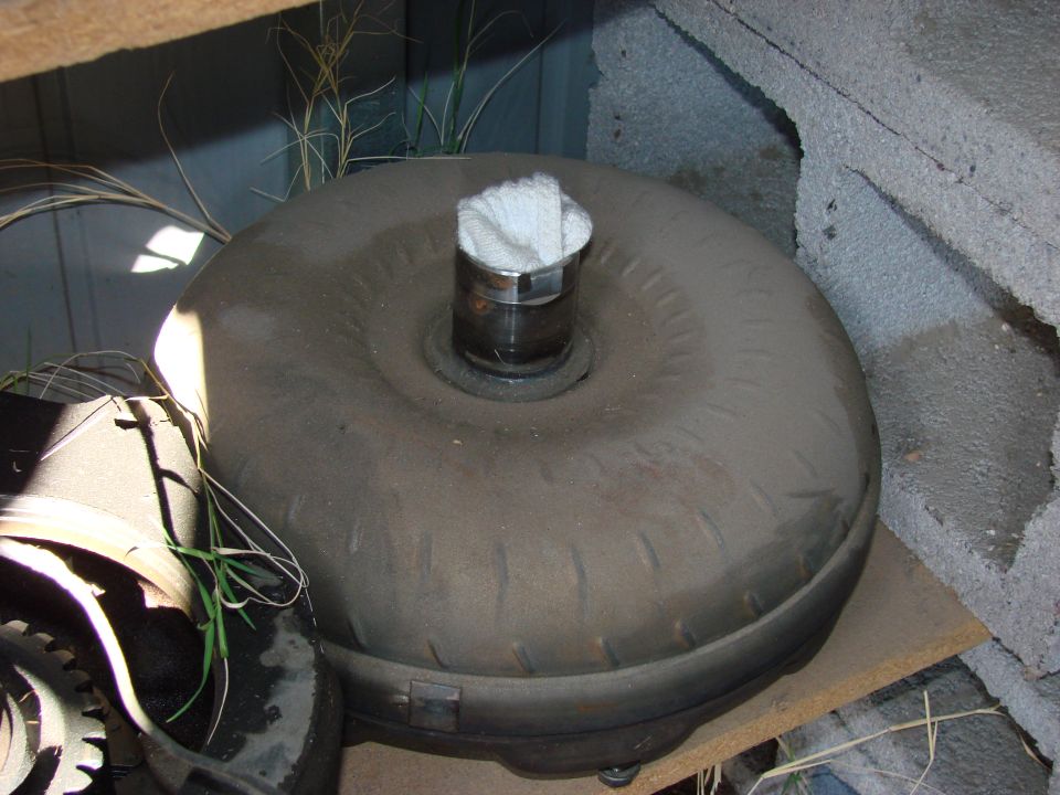 torque converter with white cloth stuffed in the input shaft opening