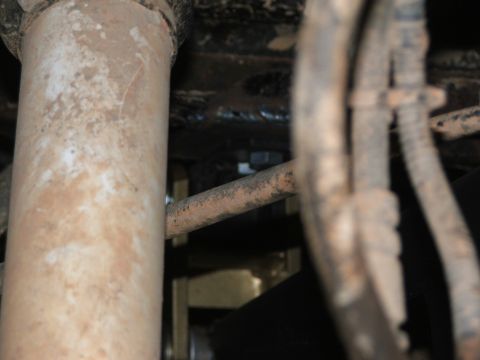 1996 Ford Bronco - Detail shot of the underbody, showing suspension components and wiring, with no clear year identification.