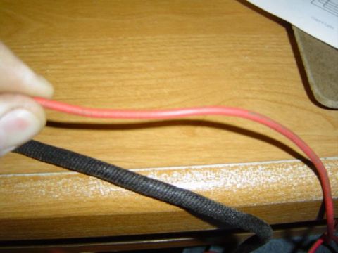 1979 Ford Bronco - Close-up of electrical wires on a wooden surface, with a Supermotors.net logo visible at the bottom.