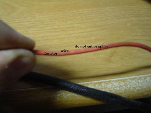 1979 Ford Bronco - Close-up of a wire labeled as a resistor, with instructions not to cut or splice.