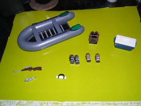 1988 Ford Bronco - Scale items Raft, cooler, hook, backpack, rifle.