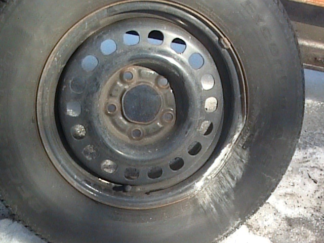 The Chrisafir's rim after it hit a curb