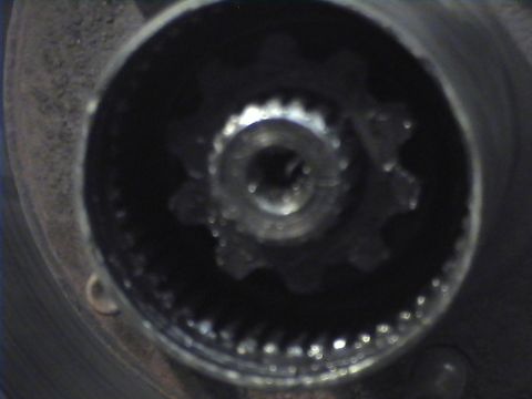1978 Ford Bronco - A close-up view of a splined hub, likely part of a vehicle's drivetrain or braking system.