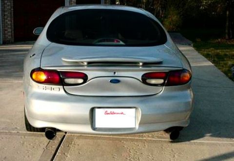 1997 Ford Taurus - Rear view of a 1997 Ford Taurus with a California license plate frame.
