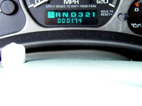 1997 Ford Taurus - The digital display on the dashboard shows the gear selection and odometer reading.