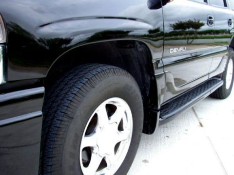1997 Ford Taurus - The 'Denali' badge confirms this is a GMC Yukon, not a Ford Taurus.