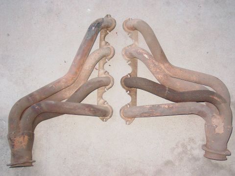 1979 Ford Bronco - These exhaust manifolds are shown against a plain background, indicating they are a spare part.